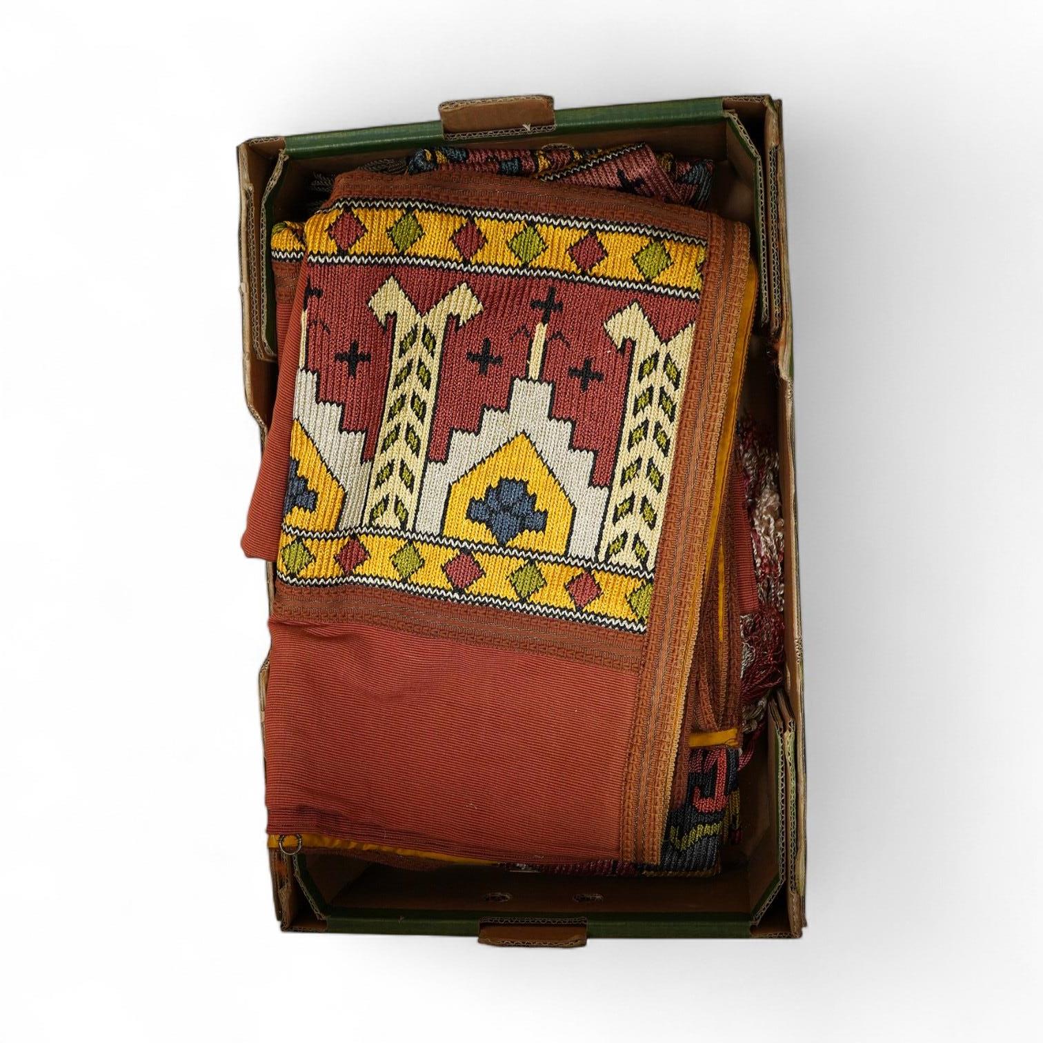 A unusual matching group of 20th century French Ecclesiastical knitted textiles, with Caucasian design elements. Hand embroidered with coloured silks in a bold geometric design, bordered with gold braiding and tasselling
